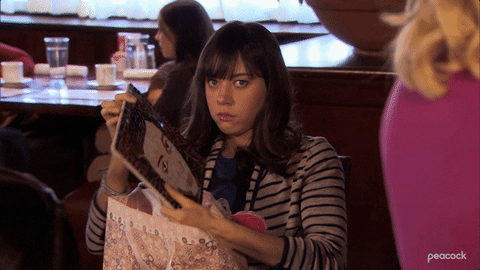 woman with a puzzle with her face on it. 