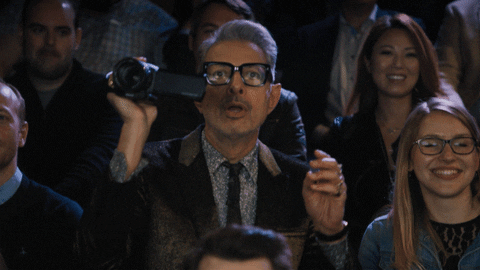 Man recording event.