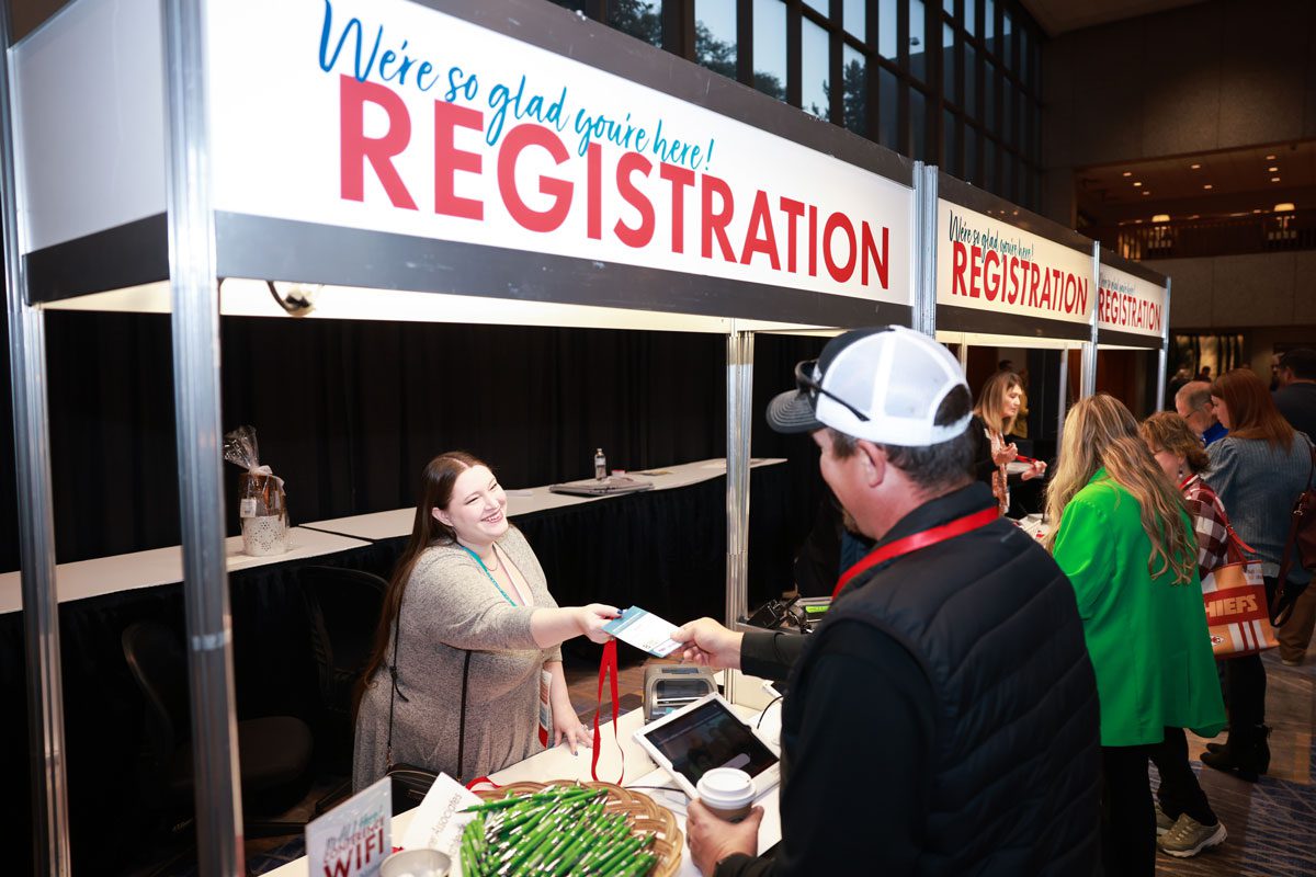 Staff working check-in, MSBA Annual Conference 2024